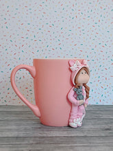 Load image into Gallery viewer, Handmade Polymer Clay 3D Girl in Pink Bunny PJs on a Pink Ceramic Mug

