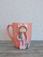 Load image into Gallery viewer, Handmade Polymer Clay 3D Girl in Pink Bunny PJs on a Pink Ceramic Mug
