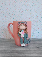 Load image into Gallery viewer, Handmade Polymer Clay 3D Girl in Grey Bear PJs on a Pink Ceramic Mug
