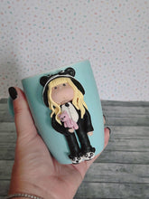 Load image into Gallery viewer, Handmade Polymer Clay 3D Blonde Girl in Panda PJs on a Blue Ceramic Mug
